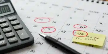 Calendar highlighting critical tax deadlines for early 2025 returns with calculator and pen.