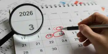 2026 calendar with highlighted tax deadlines and a magnifying glass