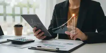 Confident person viewing a rising credit score graph on a tablet, symbolizing financial improvement and smart planning.